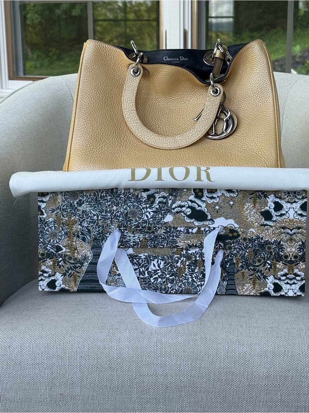 Dior Diorissimo handbag featuring silver-tone hardware and signature charms.
